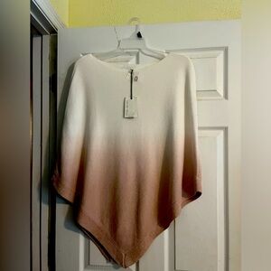 This is a new with tags Barefoot Dreams Ombré poncho.